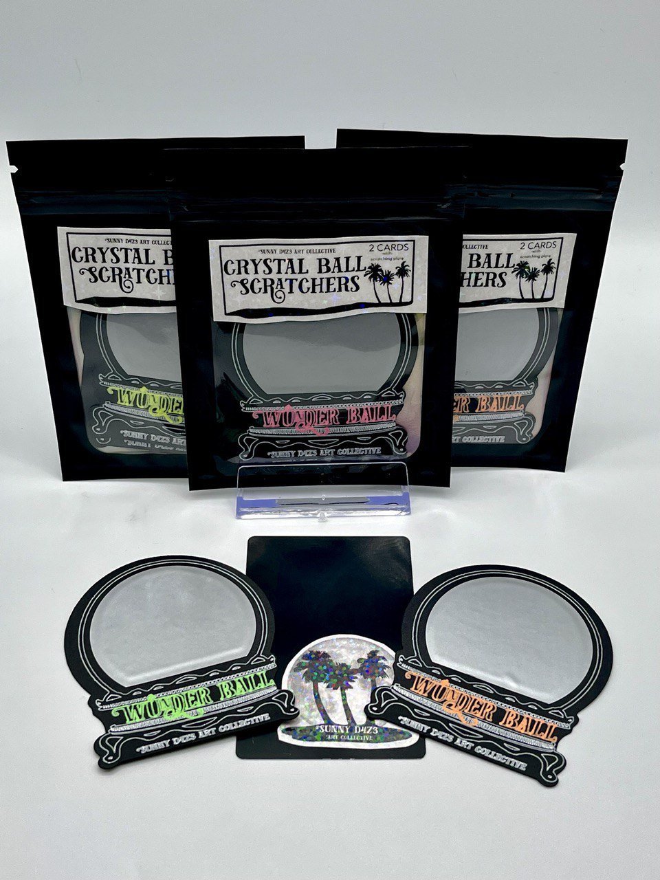 scratchers - wûnder ball crystal ball scratch off - two card pack - sunny d4z3 art collective