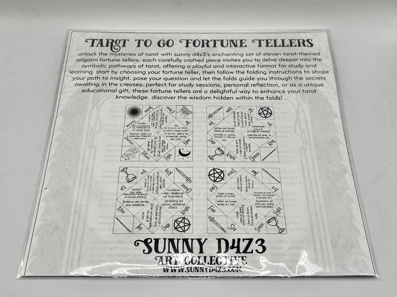 back cover of a pack of eleven tarot themed origami paper sheets
